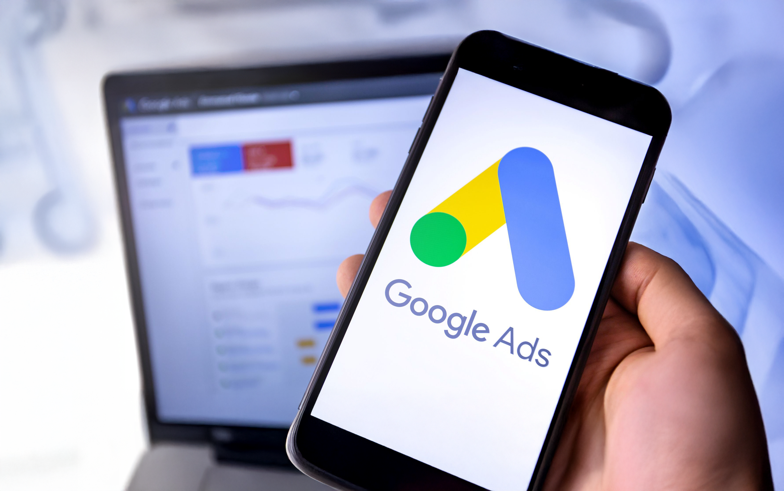 A Google Ads banner promoting tree services and the Google Guarantee.
